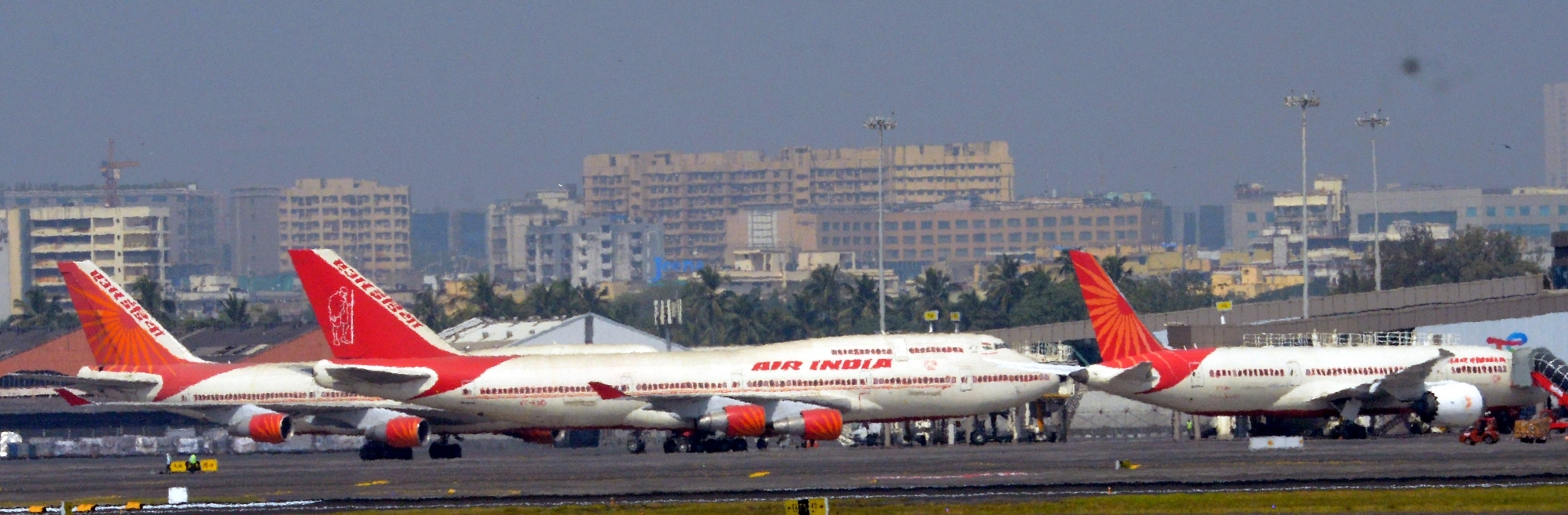 Mumbai:Air India planes are parked at Chhatrapati Shivaji Maharaj International Airport in Mumbai, on Friday Jan. 28,2022.(Photo:IANS)