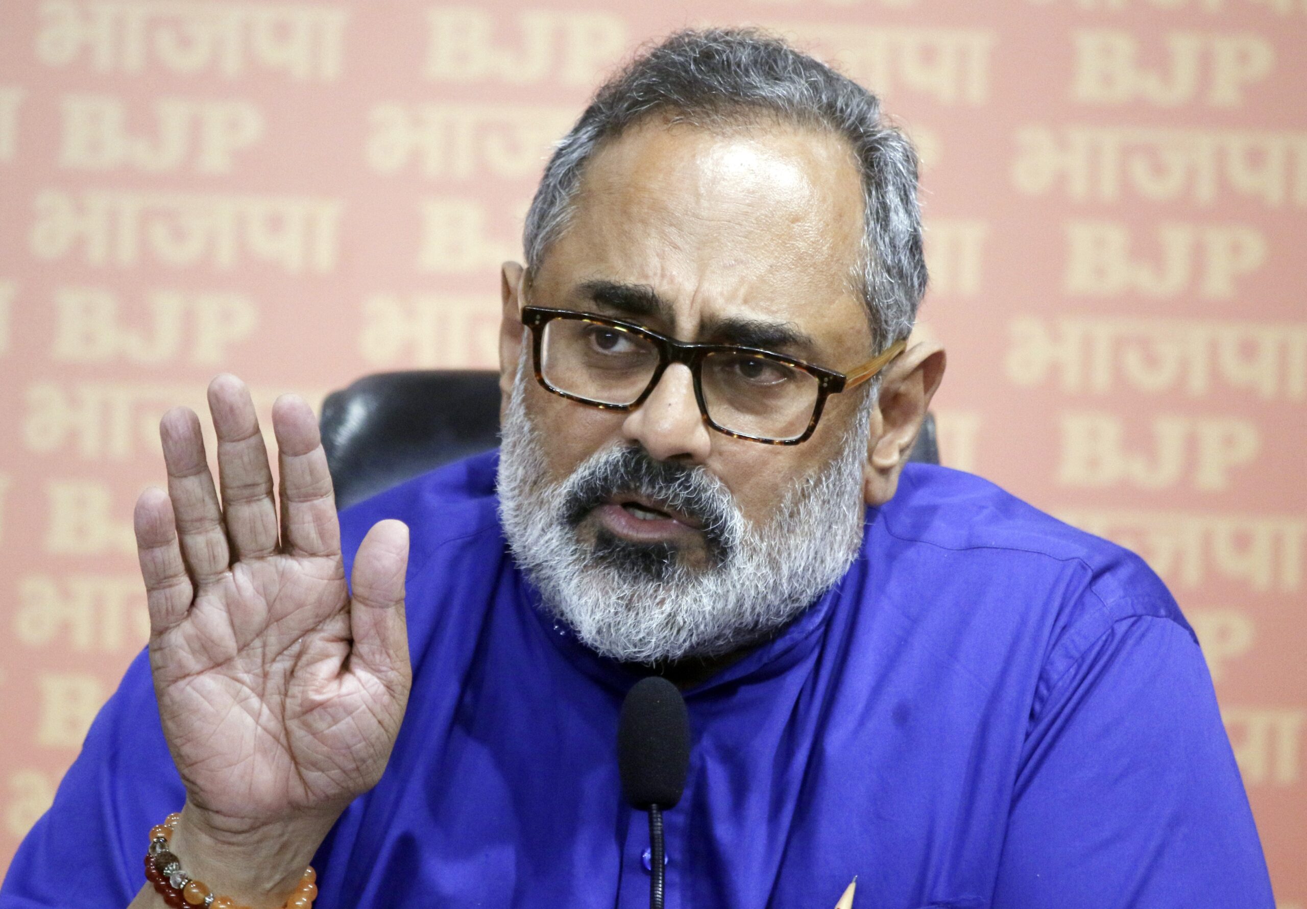 New Delhi: Union Minister Rajeev Chandrasekhar with BJP National Spokesperson Dr. Sudhanshu Trivedi addresses a press conference at BJP HQ